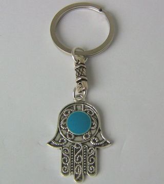 Imagen de LLAVERO MANO FATIMA CON FILIGRANA AZUL TURQUESA 41X29 MMS